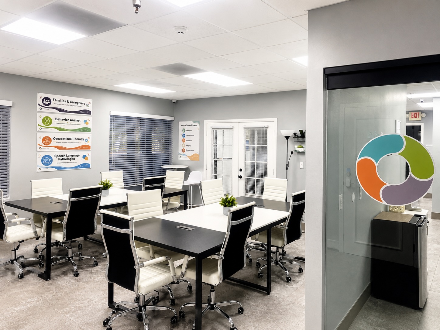 Forum room — conference and training space with modular tables and seating for a group